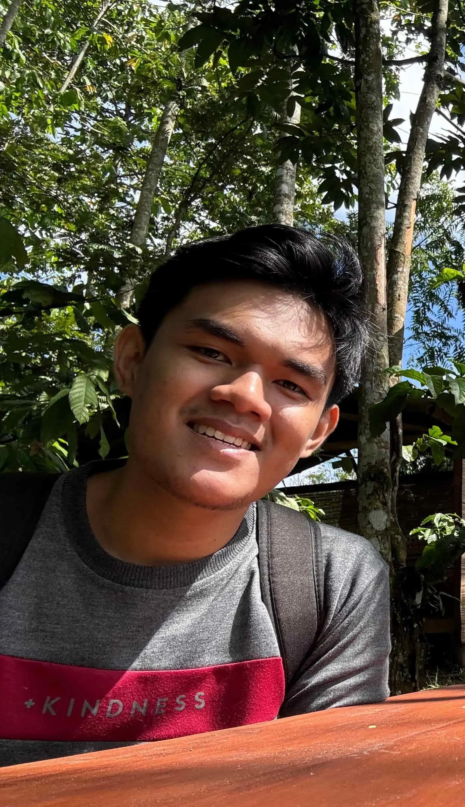 Professional portrait of Gustio Nusamba